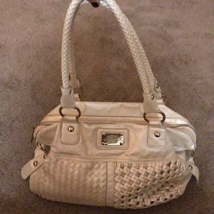 Buckle shoulder purse.